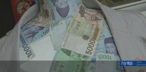 방송타서 망한 동전예술가.jpg