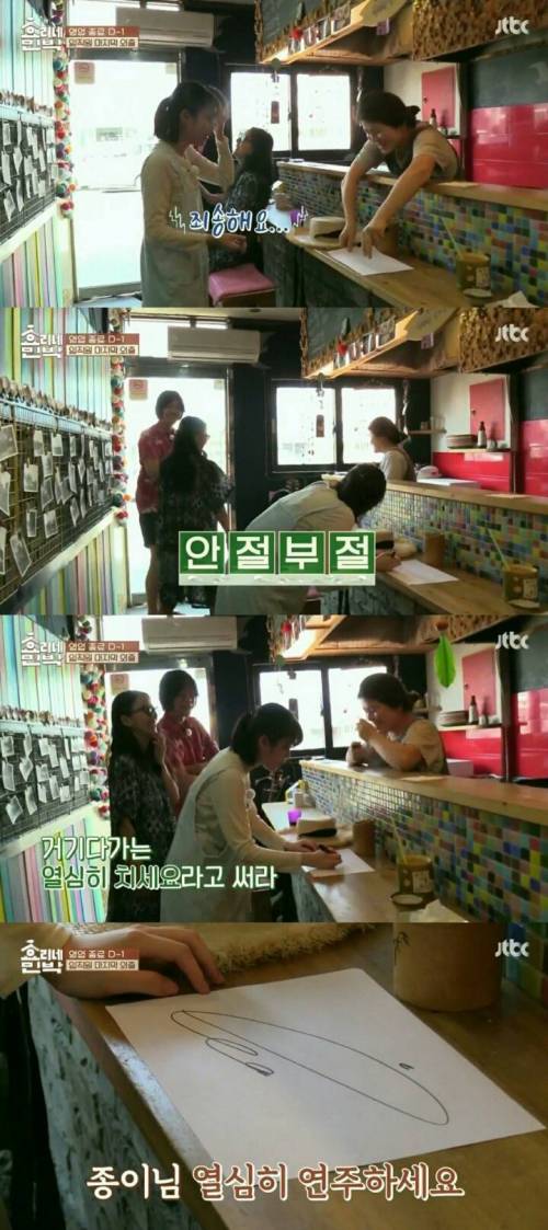 기타에 사인해주는 아이유.jpg